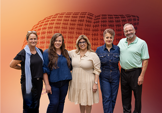 A group of 5 people standing together